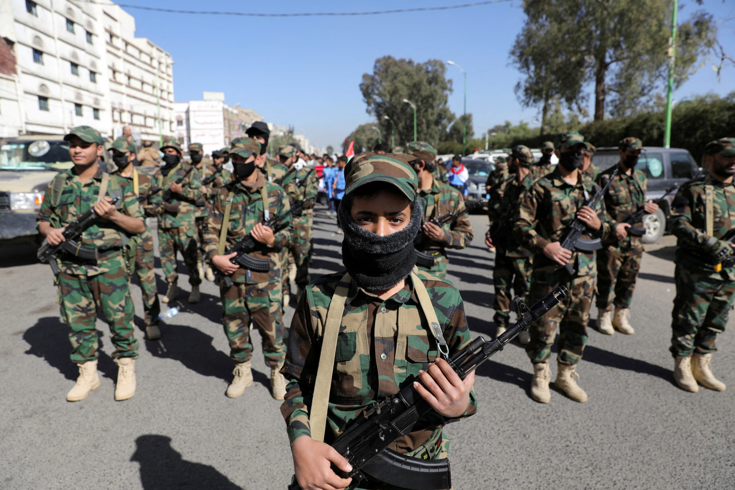 Houthi fighters take part in a parade in Sanaa, Yemen, December 18, 2024. (REUTERS/Khaled Abdullah)