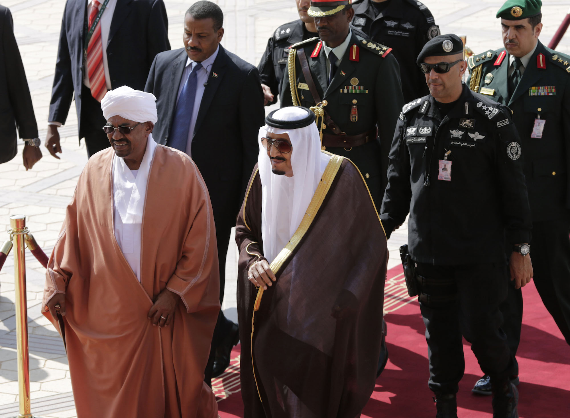 King Salman of Saudi Arabia receives Sudanese President Omar al-Bashir during his arrival in Riyadh on November 10, 2015.