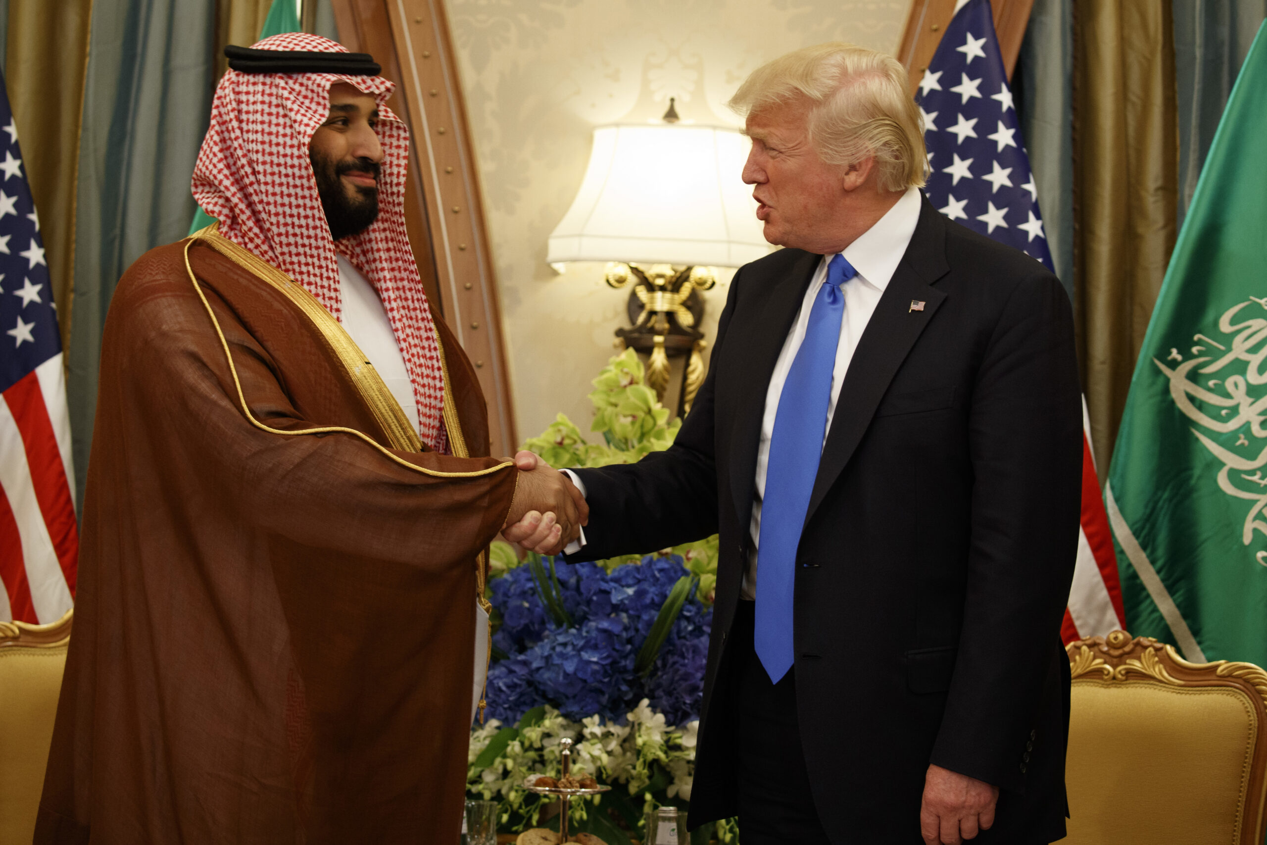 President Donald J. Trump shakes hands with Saudi Arabia's then deputy crown prince and defense minister, Mohammed bin Salman, during a bilateral meeting, in Riyadh, May 20, 2017. (AP Photo/Evan Vucci, File)