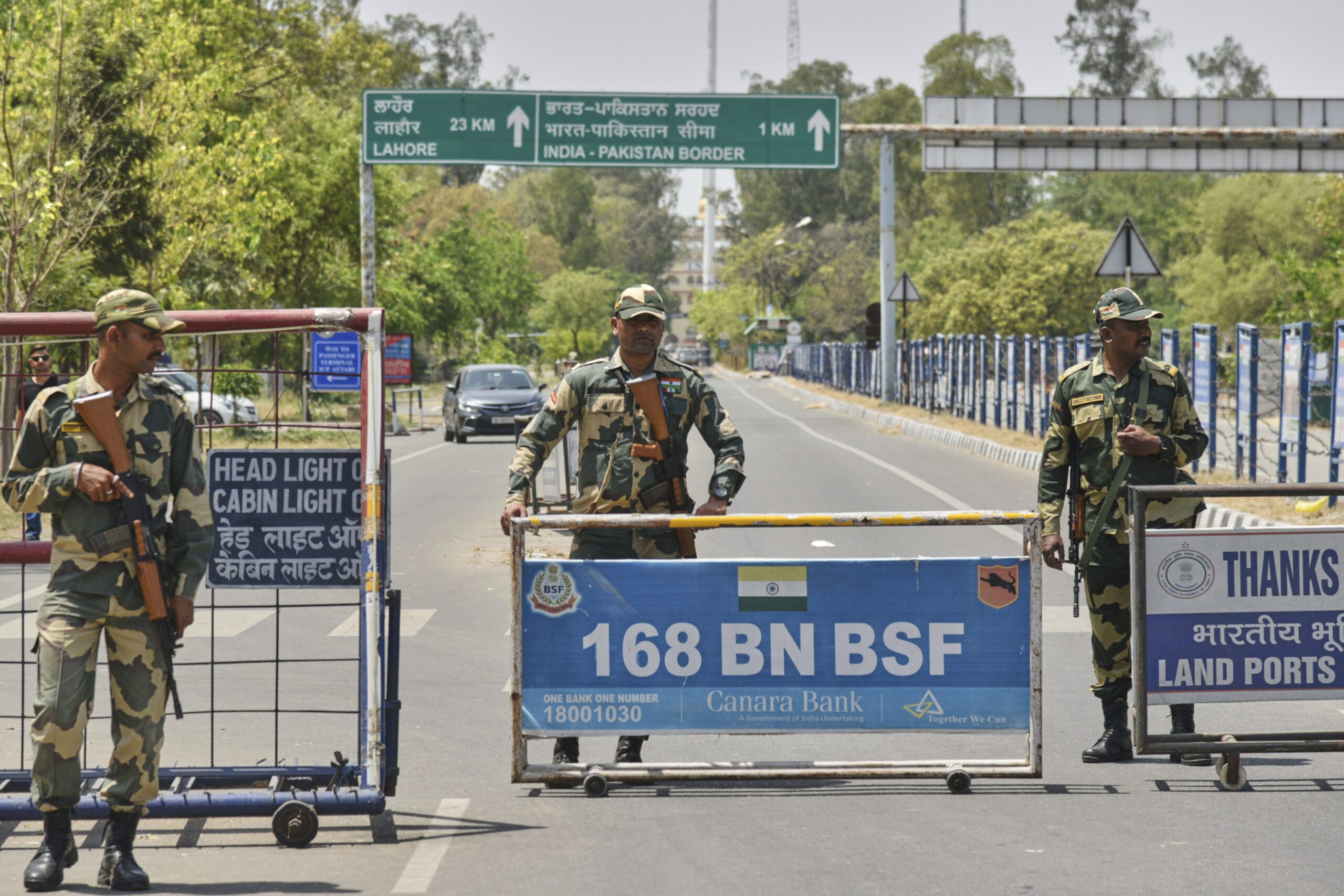 Indian Border Security Force soldiers stand guard at the barricade on the road leading to the Attari-Wagah border near Amritsar, April 24. (AP Photo/Prabhjot Gill)
