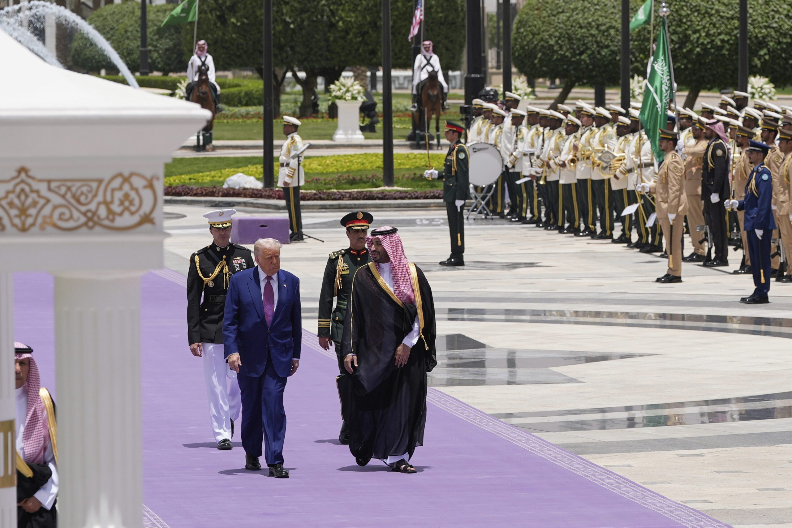 President Donald J. Trump and Saudi Crown Prince Mohammed bin Salman walk during an arrival ceremony at the Royal Palace in Riyadh, Saudi Arabia, May 13. (AP Photo/Alex Brandon)