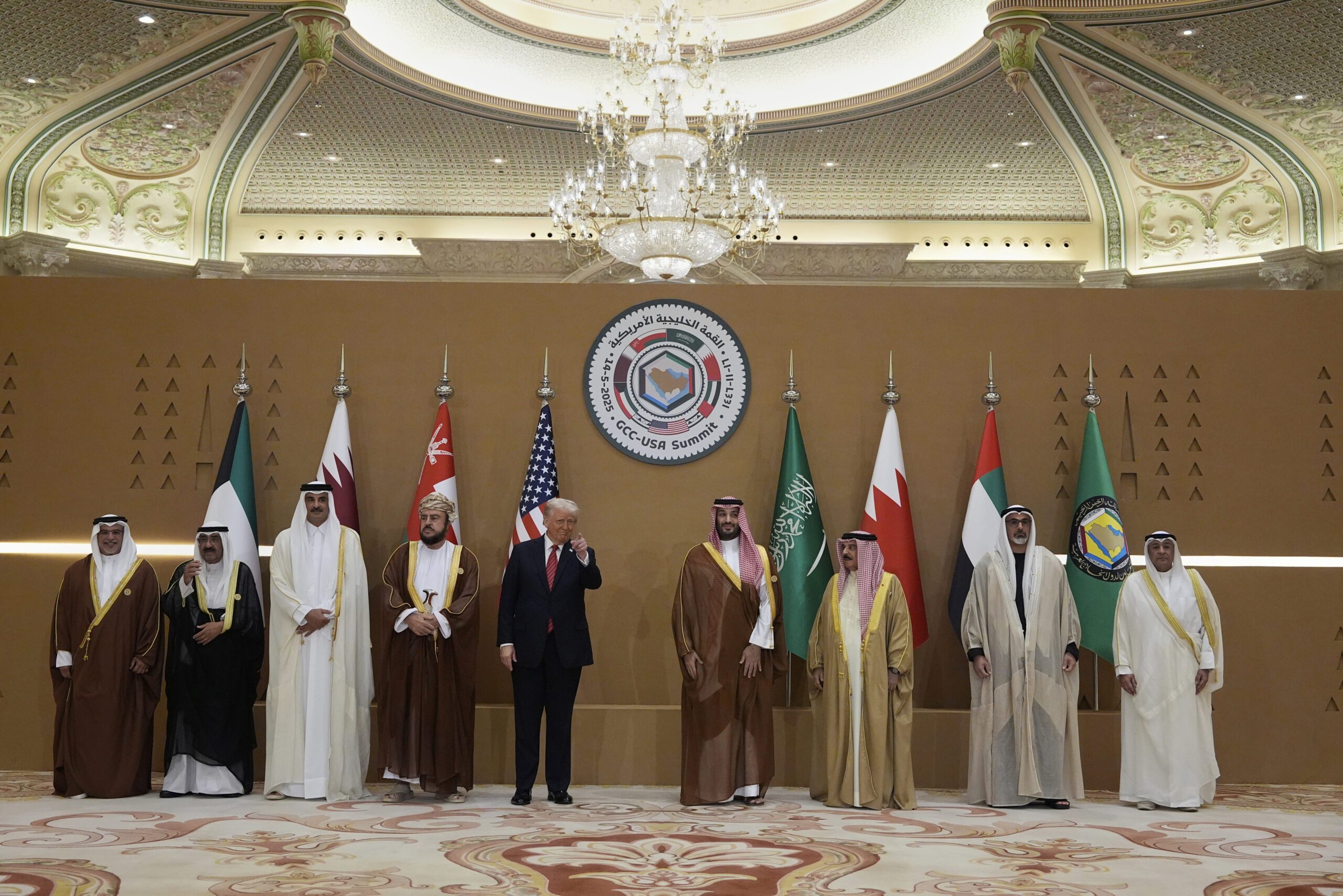President Donald J. Trump, fifth left, attends a group photo session with Saudi Crown Prince Mohammed bin Salman, fourth right, UAE Crown Prince Khaled bin Mohammed bin Zayed al-Nahyan, second right, Bahraini Crown Prince and Prime Minister Salman bin Hamad al-Khalifa, left, Qatari Emir Tamim bin Hamad al-Thani, third left, Kuwaiti Emir Meshal al-Ahmed al-Jaber al-Sabah, second left, GCC Secretary-General Jasem Albudaiwi, right, during the GCC Summit in Riyadh, Saudi Arabia, May 14. (AP Photo/Alex Brandon)