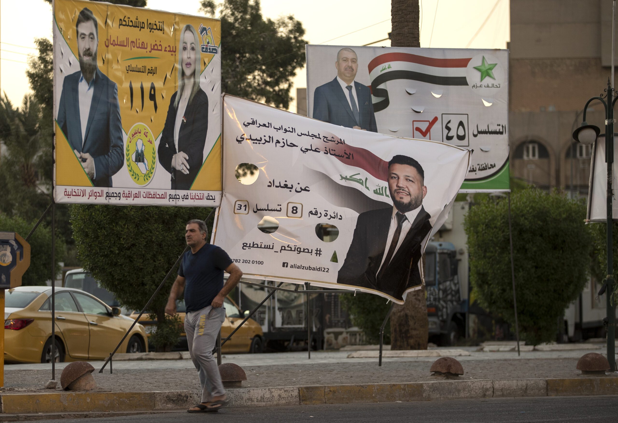 Campaign posters for upcoming parliamentary elections are displayed in central Baghdad, Iraq, Sept. 19. (AP Photo/Hadi Mizban)