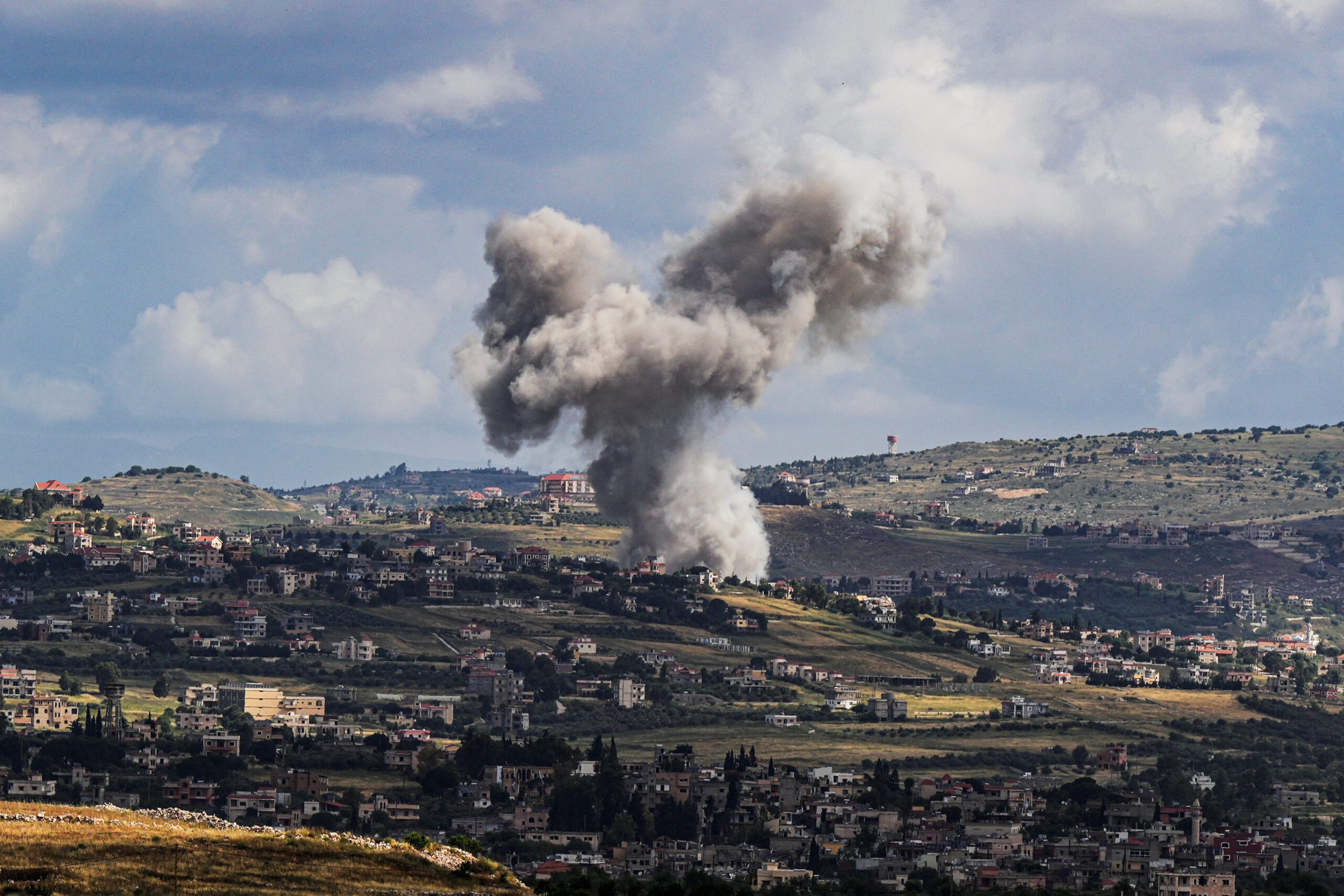 Smoke rises above Lebanon following an Israeli strike, amid ongoing cross-border hostilities between Hezbollah and Israeli forces, as seen from northern Israel, May 5. (REUTERS/Ayal Margolin)