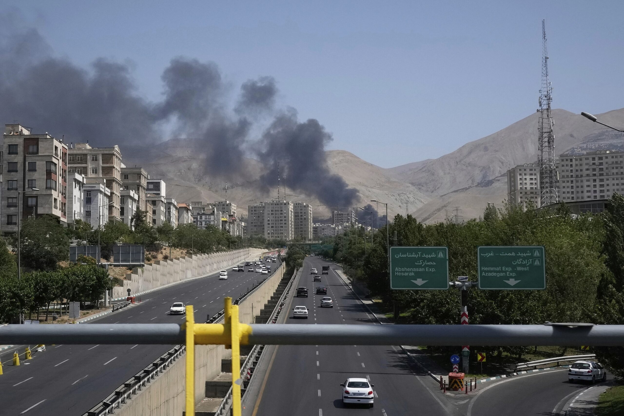Smoke rises from an oil storage facility after it appeared to have been struck by an Israeli strike, in Tehran, Iran, June 16. (AP Photo/Vahid Salemi)