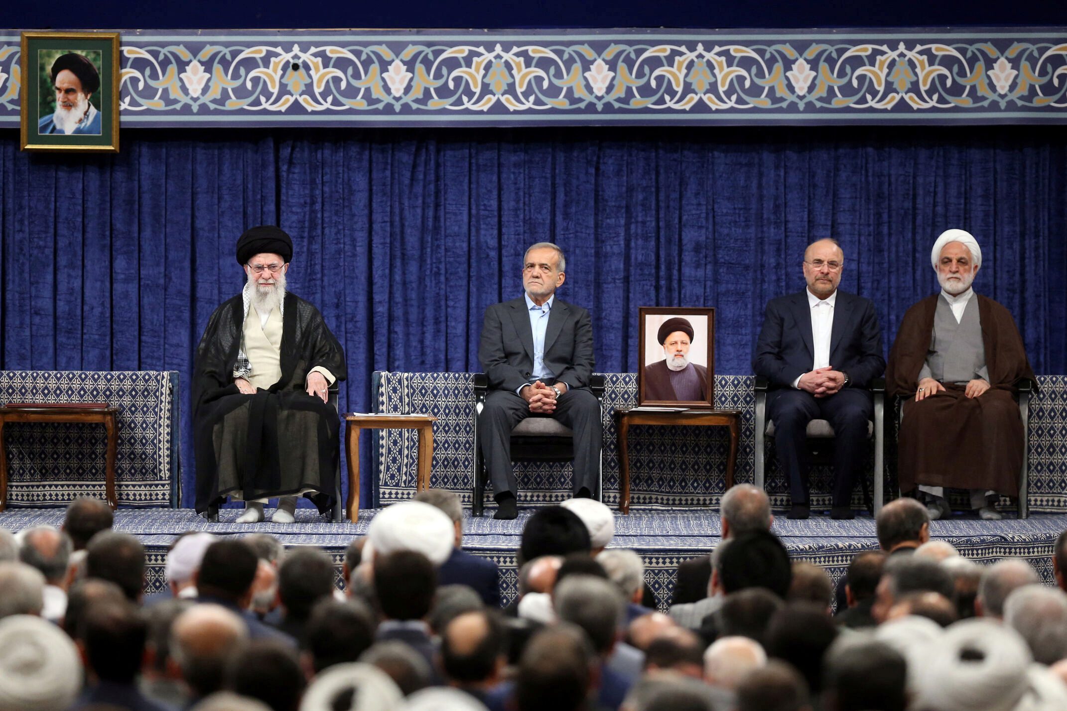 Iranian Supreme Leader Ayatollah Ali Khamenei and President Masoud Pezeshkian attend an endorsement ceremony in Tehran, Iran, July 28, 2024. (Office of the Iranian Supreme Leader/WANA /Handout via REUTERS)