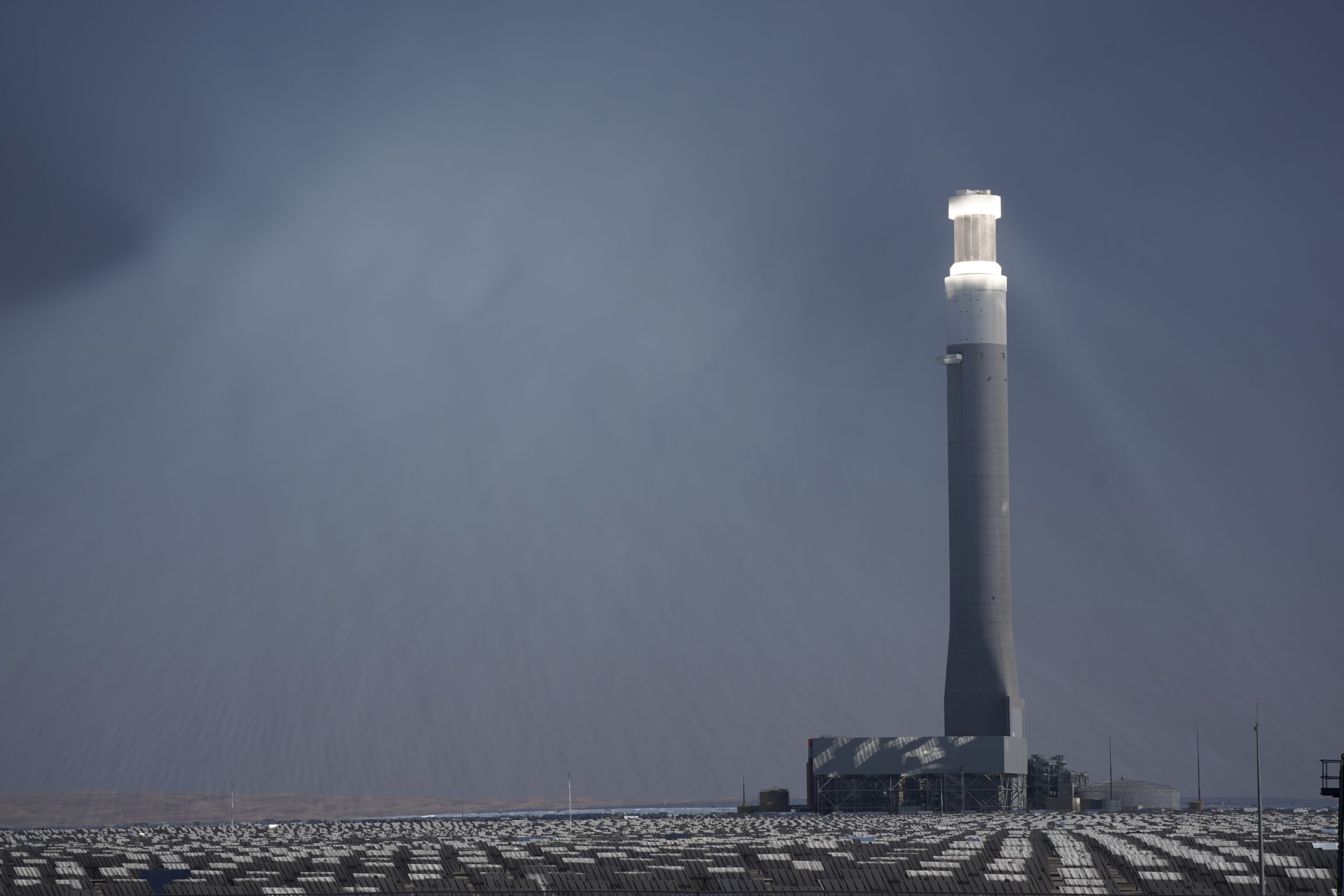 A solar tower and panels operate at Mohammed bin Rashid Al Maktoum Solar Park Dec. 11, 2023, in Dubai, United Arab Emirates. (AP Photo/Joshua A. Bickel)