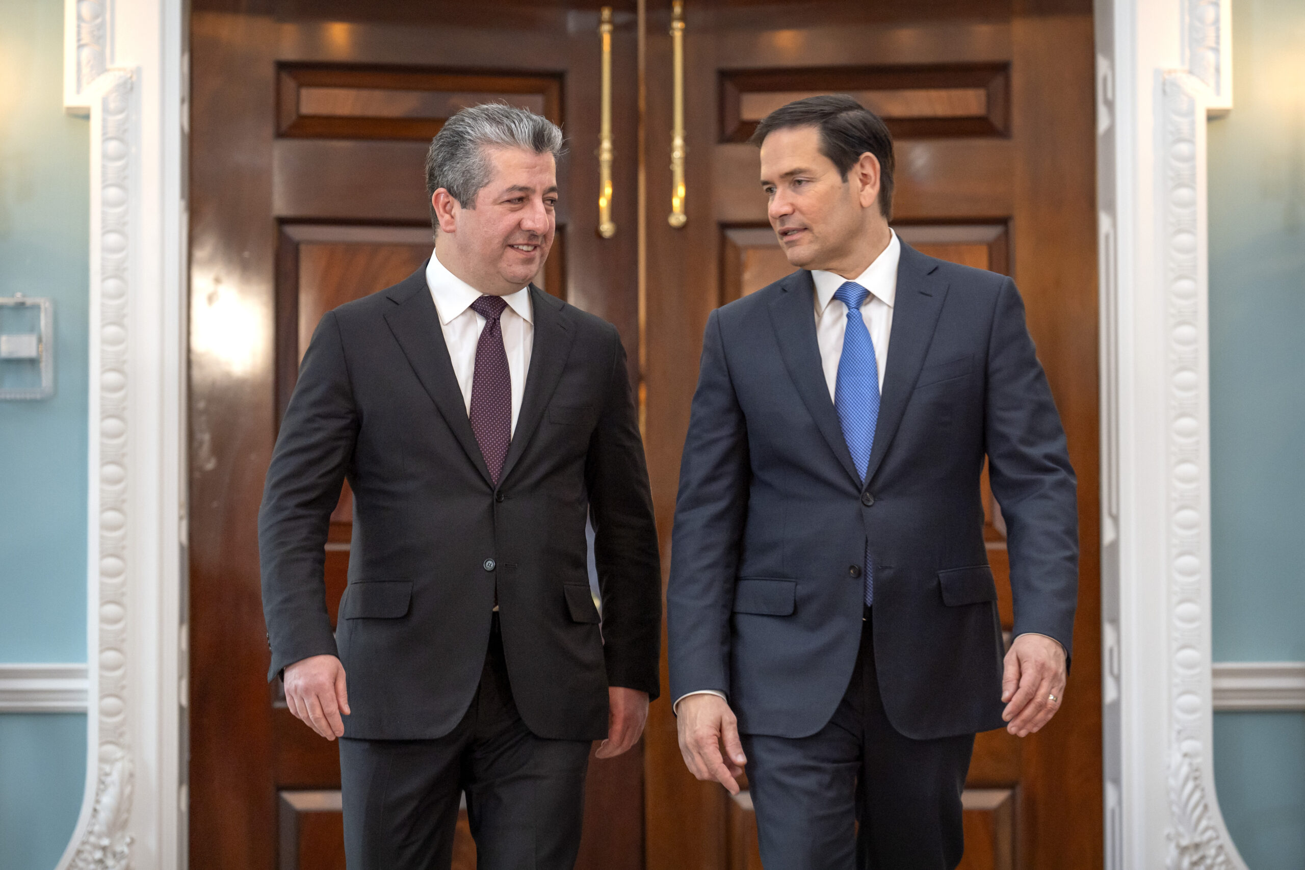 Masrour Barzani, prime minister of Iraq's semi-autonomous northern Kurdish region, left, walks with Secretary of State Marco Rubio at the State Department, May 23, in Washington, DC. (AP Photo/Mark Schiefelbein).