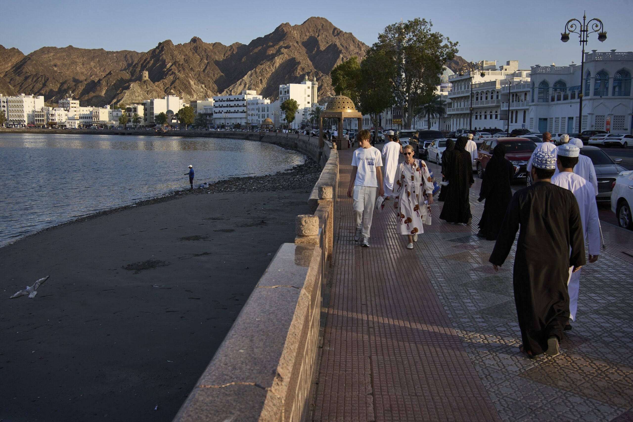 Visitors and locals gather at the Mutrah Corniche in Muscat, Oman, April 11. (AP Photo/ Fatima Shbair)