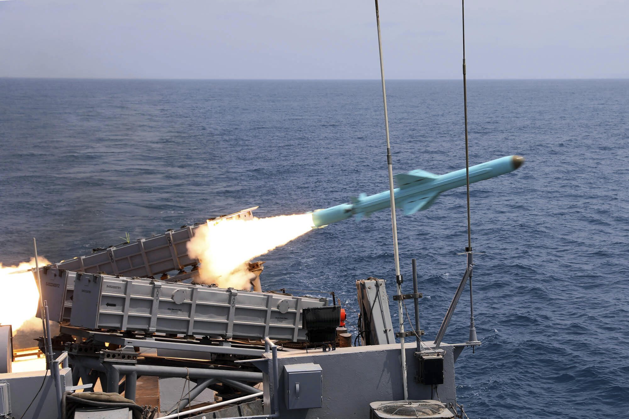 A missile is fired from a vessel during an Iranian navy drill in the Gulf of Oman and the Indian Ocean, August 21. (Masoud Nazari Mehrabi/Iranian Army via AP)