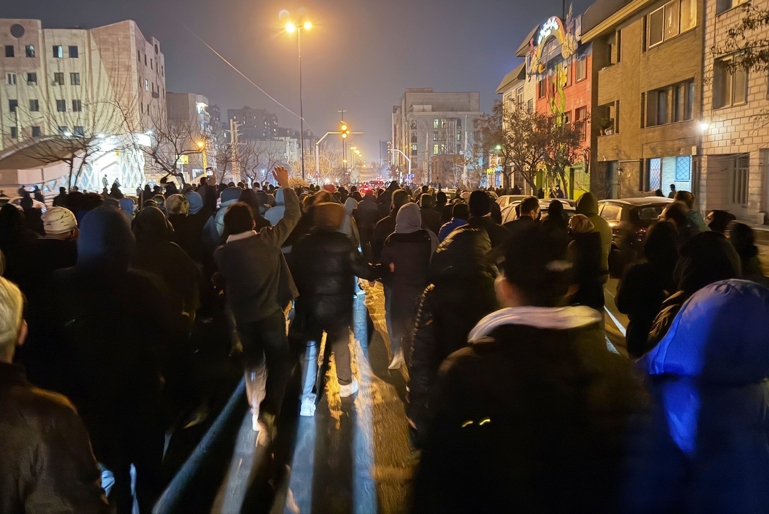 In this photo obtained by The Associated Press, Iranians attend an anti-government protest in Tehran, Iran, Jan. 8. (UGC via AP)