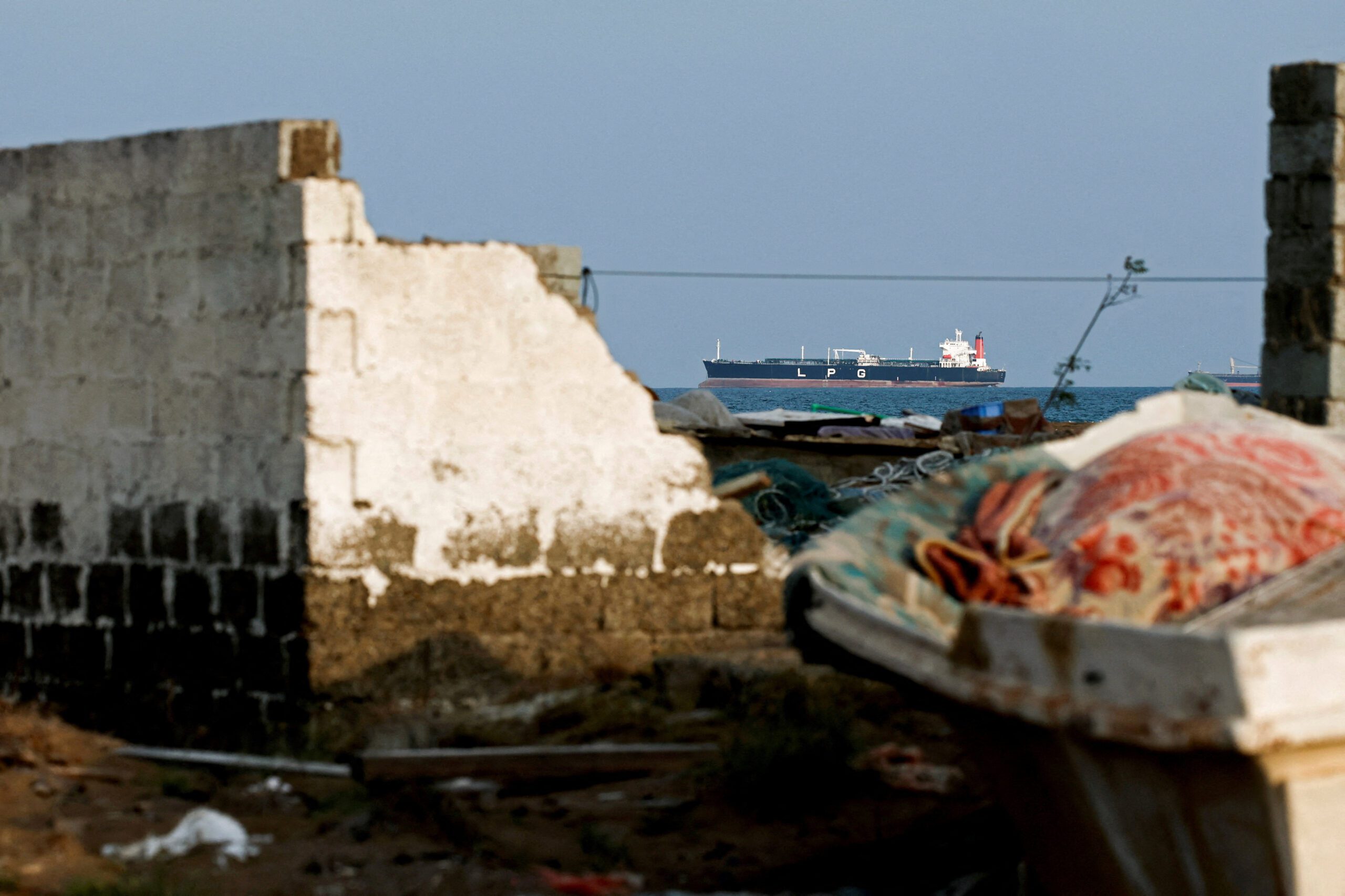 An LPG gas tanker at anchor as traffic is down in the Strait of Hormuz, in Shinas, Oman, March 11. (REUTERS/Benoit Tessier)