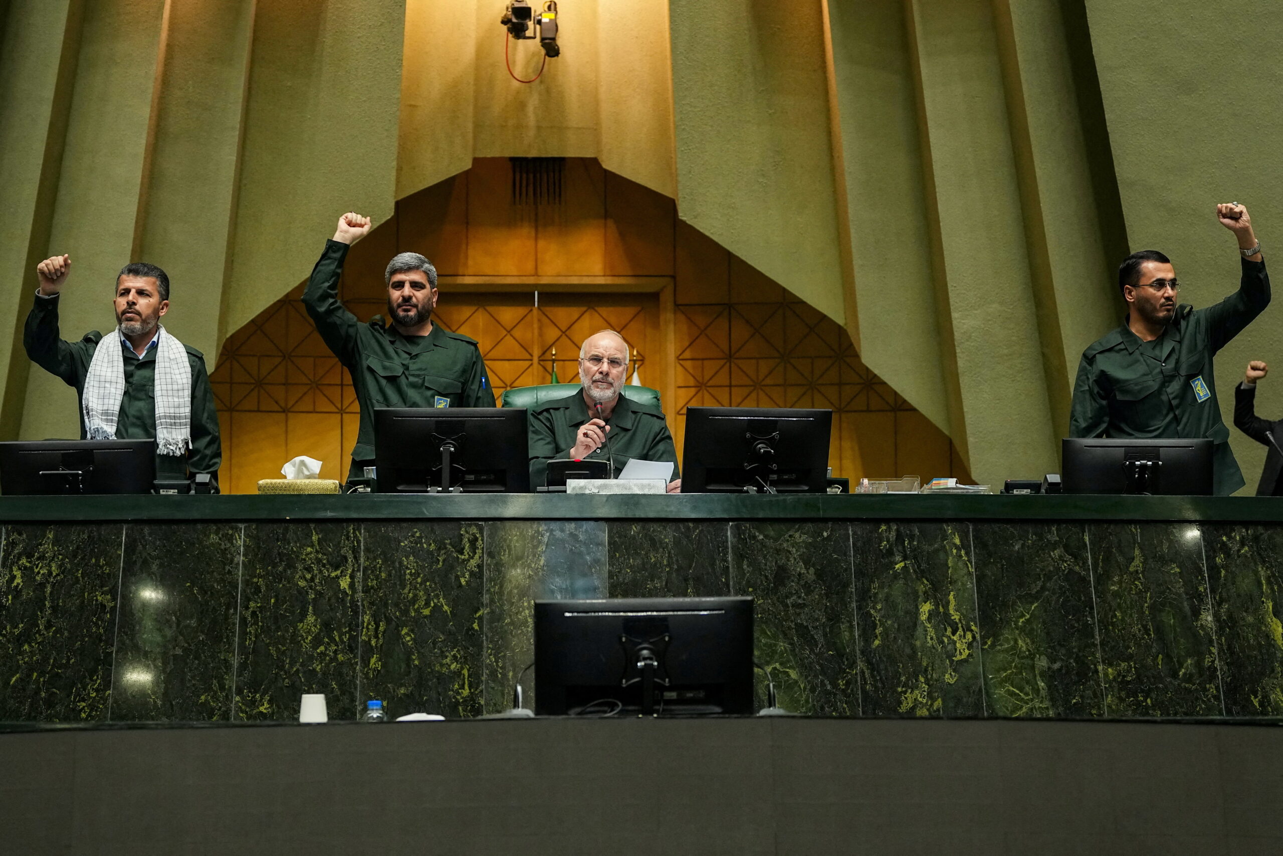 Iranian Parliamentary Speaker Mohammad-Bagher Qalibaf looks on as members of Parliament chant in support of the Islamic Revolutionary Guard Corps in Tehran, Iran, February 1. (Hamed Malekpour/Islamic consultative assembly news agency/WANA/Handout via REUTERS)